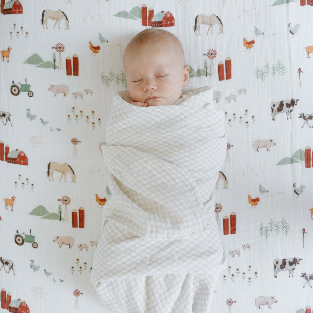 Little Unicorn soft cotton muslin nursing cover option.