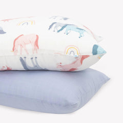 Little Unicorn standard pillowcase 2-pack shows plush muslin texture for a soft sleep experience.