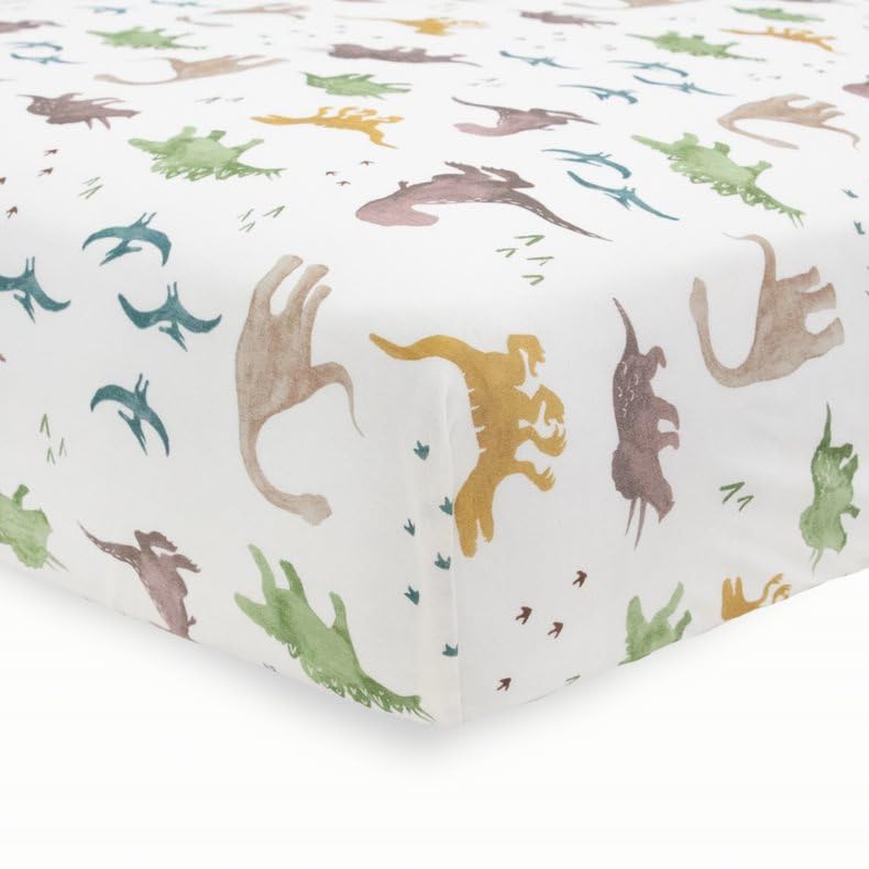 Little Unicorn stretch-fit crib sheet on mattress for a snug, tidy fit.