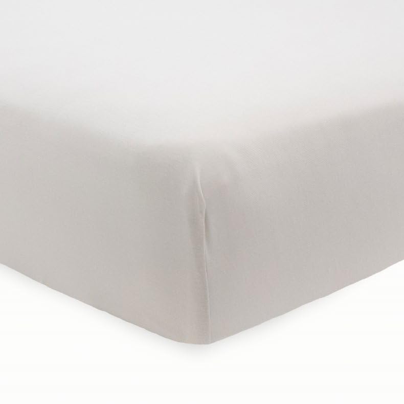 Little Unicorn stretch-knit crib sheet Pebble maintains a snug fit on standard cribs