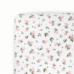 Little Unicorn stretch knit crib sheet in Watercolor Rose offers a soft, snug fit.