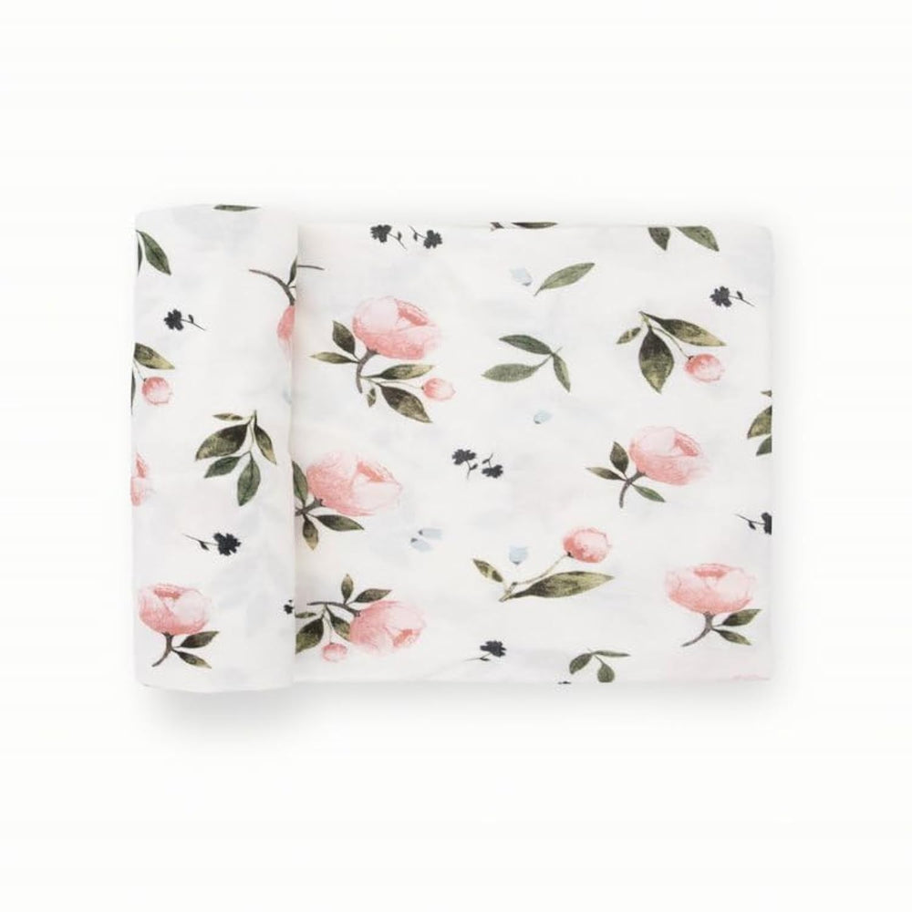 Little Unicorn stretch knit swaddle blanket in watercolor rose for soft newborn comfort.