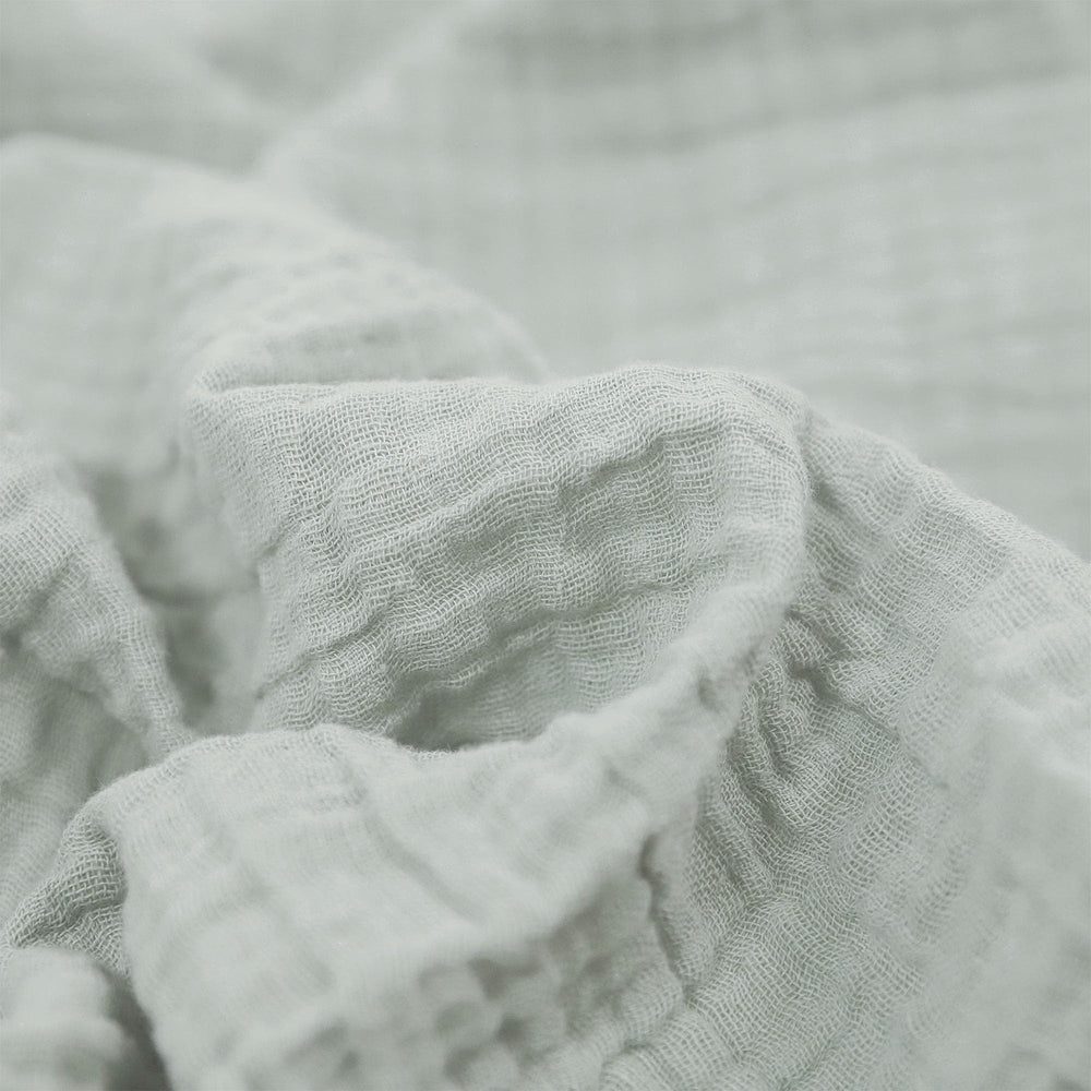 Little Unicorn muslin swaddle with pencil floral pattern for gentle wrapping