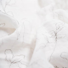 Little Unicorn 2-pack swaddle set in pencil floral design for versatile use