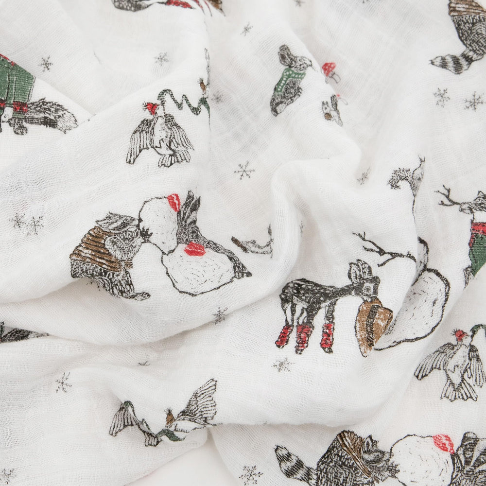 Little Unicorn swaddle blanket in soft breathable muslin fabric