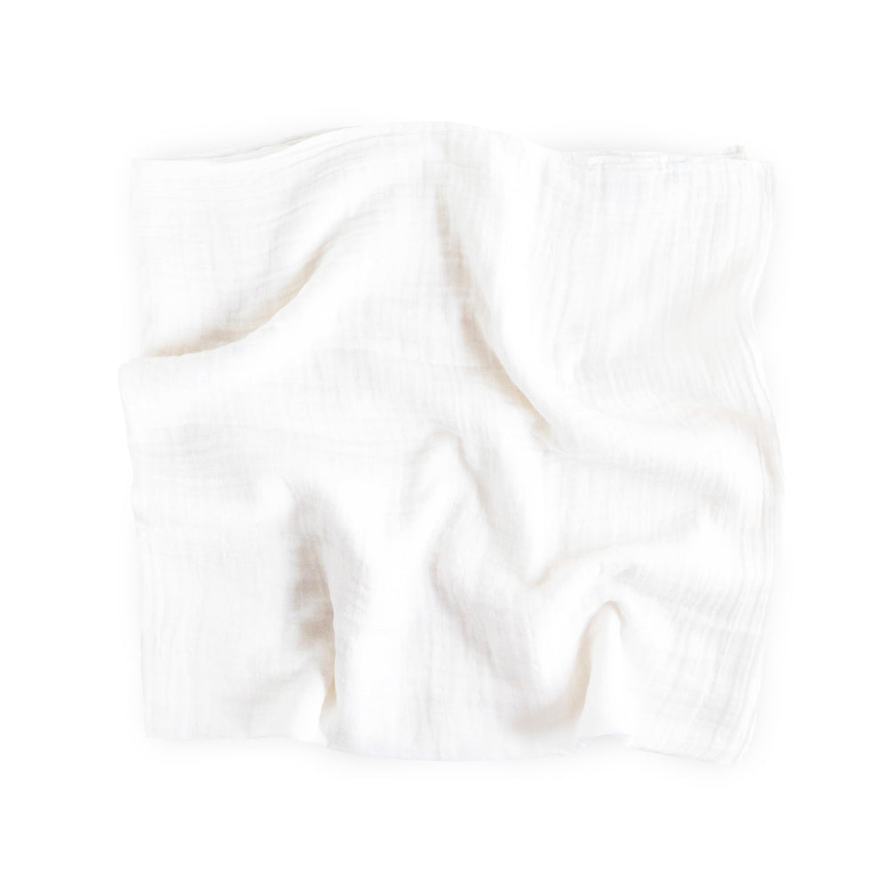 Little Unicorn swaddle close-up shows 100% cotton muslin texture for cozy swaddling.