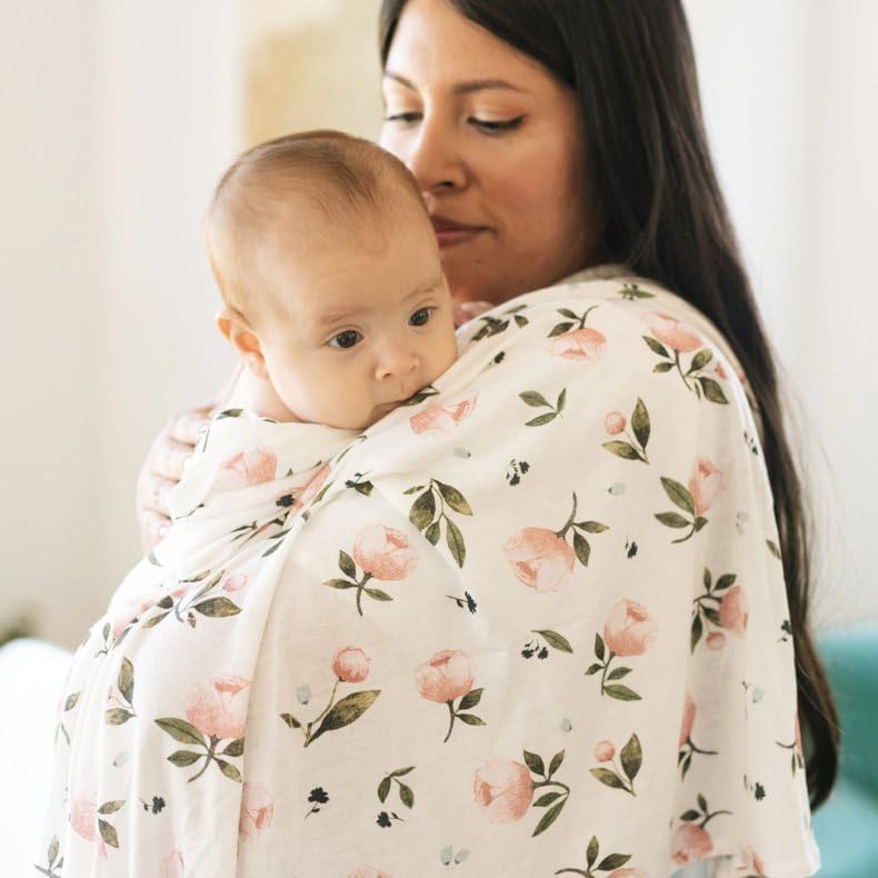 Little Unicorn stretch-knit swaddle in watercolor rose at 47x47 inches for roomy swaddling.