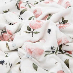 Little Unicorn swaddle watercolor rose car seat cover helps shield baby on outings.