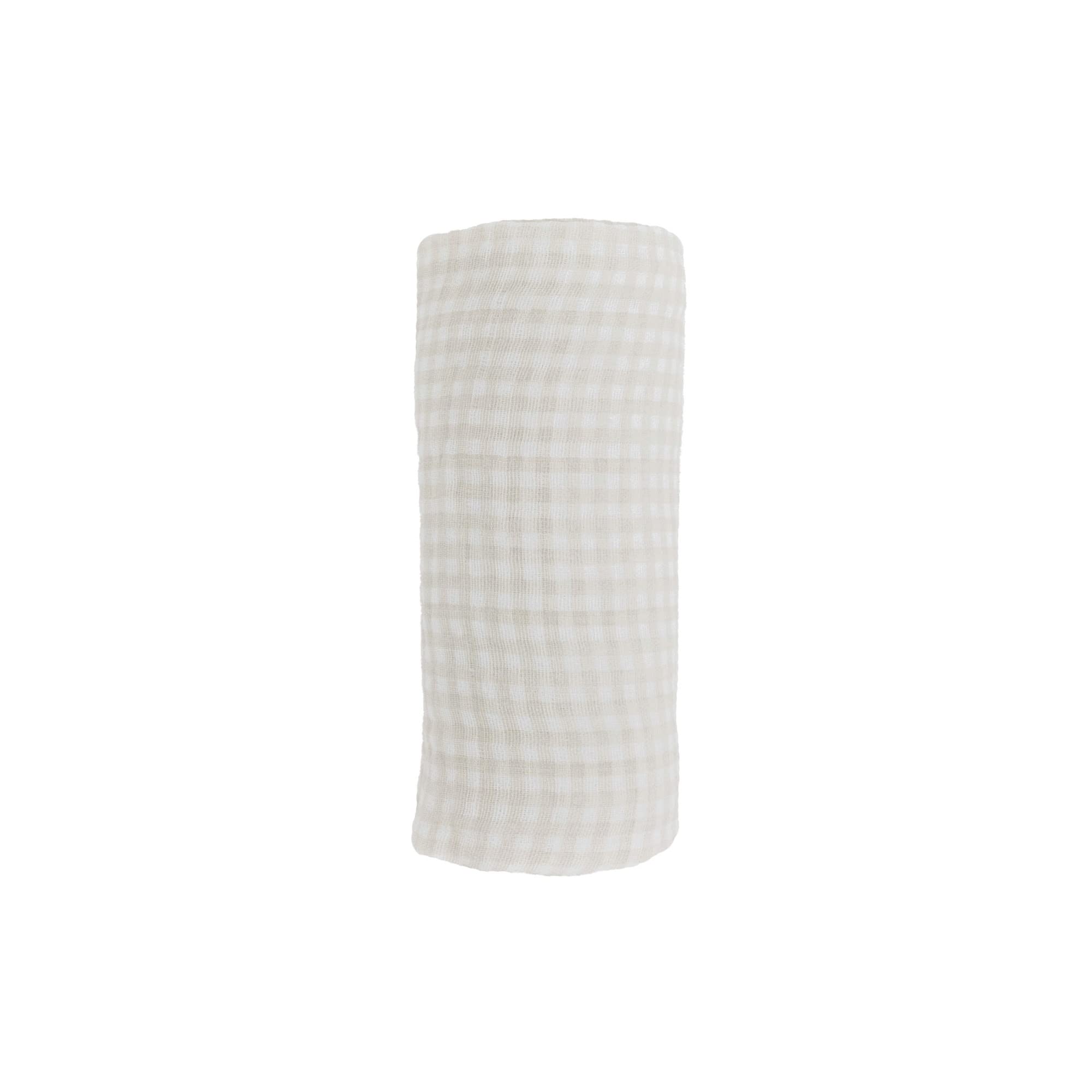 Little Unicorn tan gingham swaddle on baby for secure, comfortable rest.