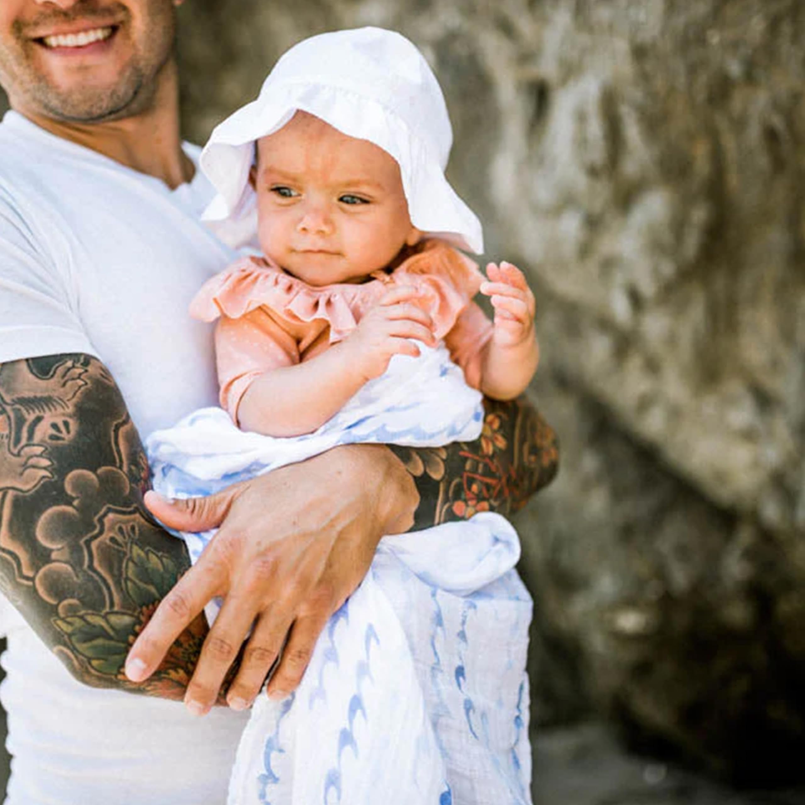 Little Unicorn unisex design swaddle offers gender-neutral charm for nurseries.