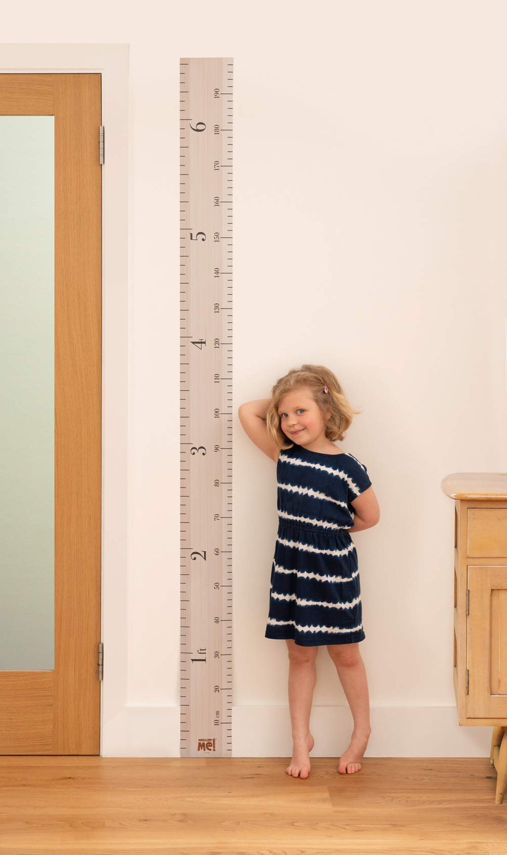 Little Wigwam Measure Me height chart with a marker for recording names and ages.