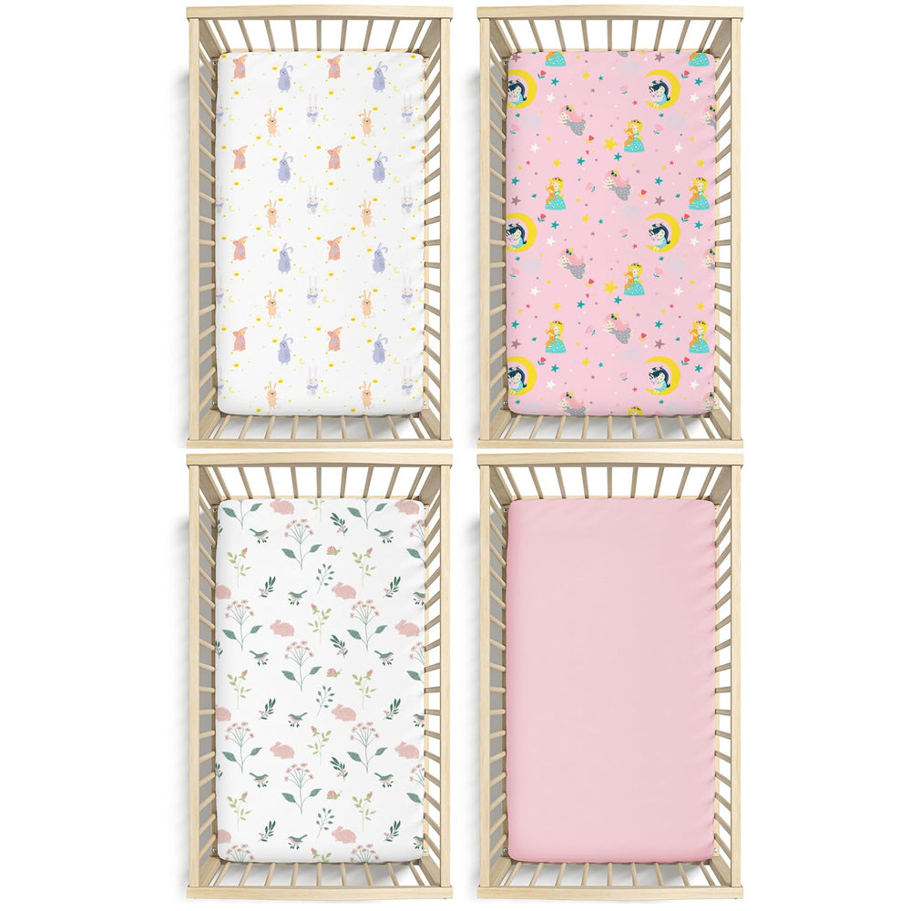 Little Grape Land four-pack crib sheets laid flat for easy nursery refresh