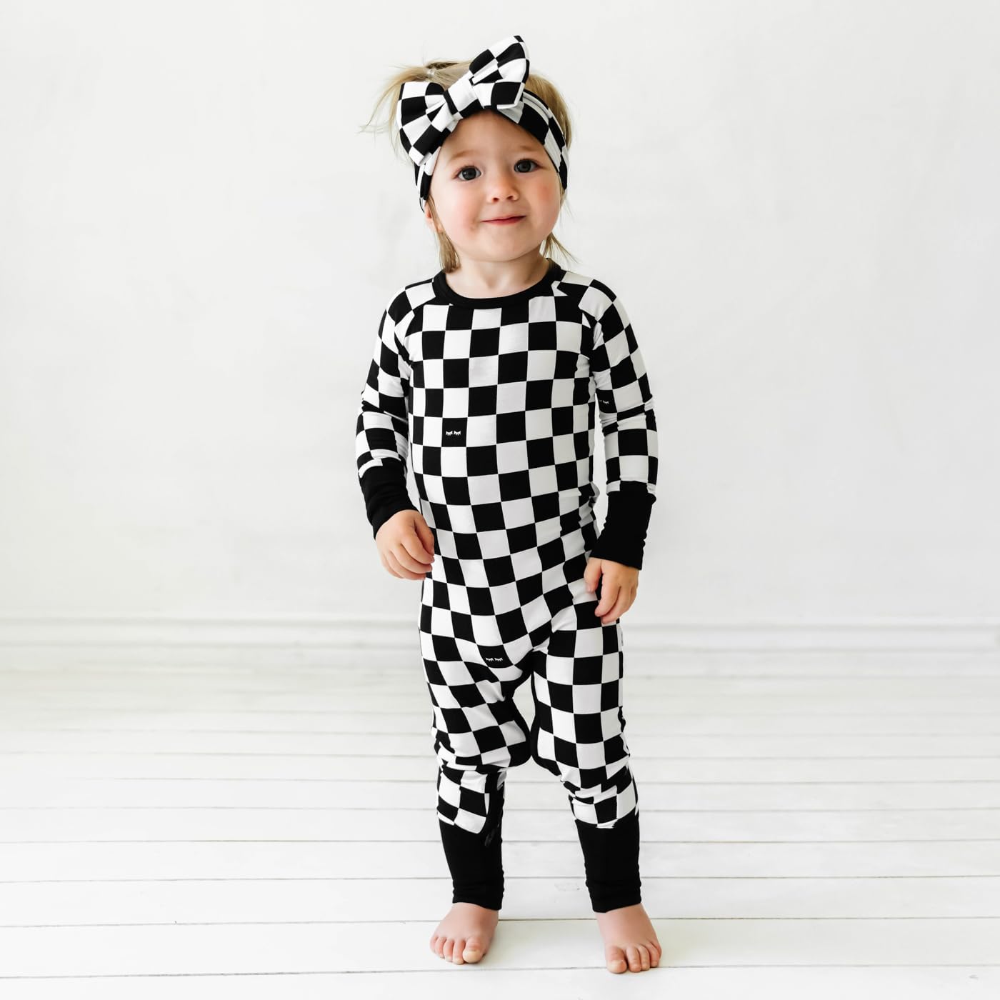 Little Sleepies Luxe Bow Headband Checks includes safety note for proper play and wear