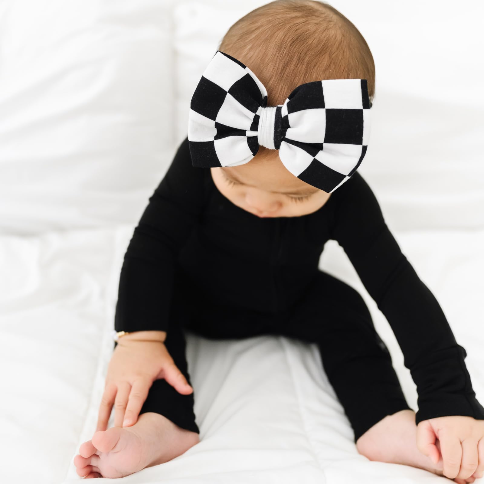 Little Sleepies Luxe Bow Headband Checks highlights soft stretchy fabric, comfortable all day