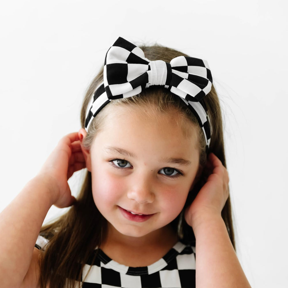 Little Sleepies Luxe Bow Headband Checks emphasizes tagless design for irritation-free wear