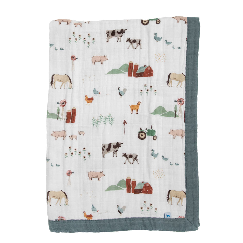 Little Unicorn farmyard newborn receiving quilt in soft muslin for cozy, breathable snuggles