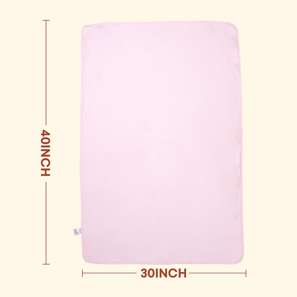 Littogoose Baby Comforter in crib-size 30x40 is laid ready for use.