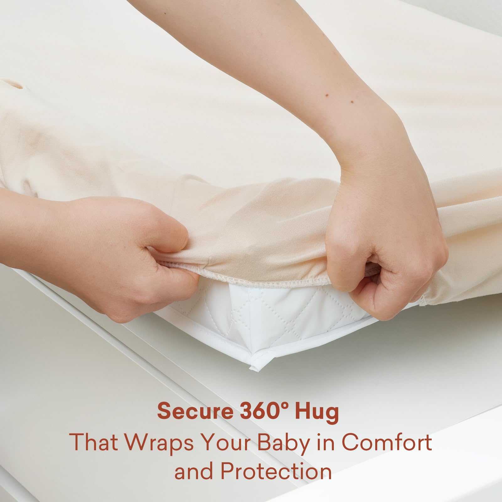 Openings for safety straps on the Littogoose cover for secure diaper changes