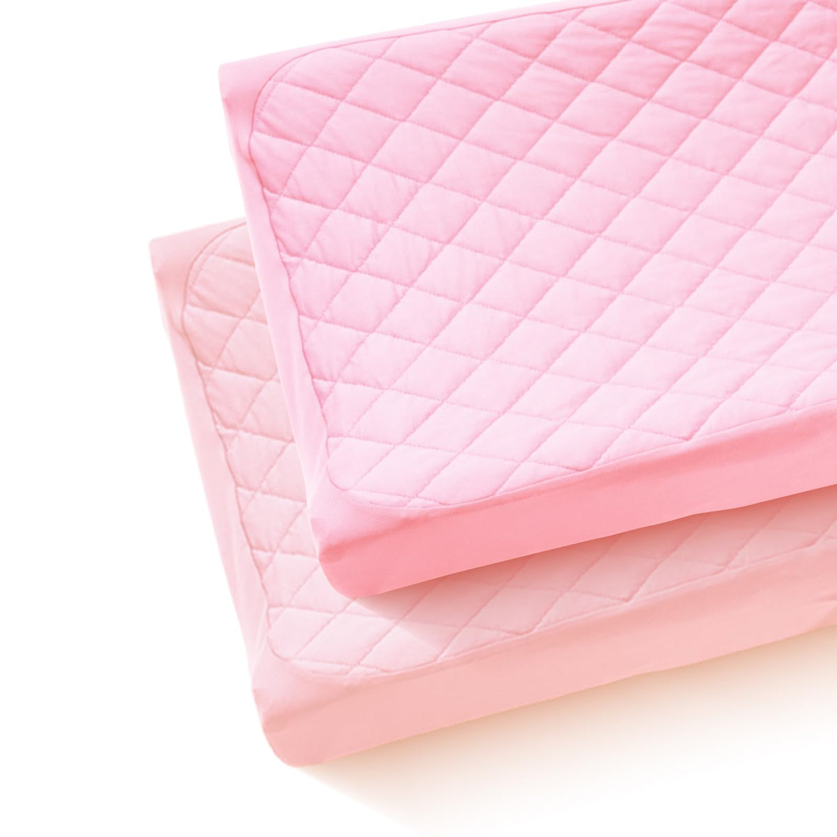Littogoose quilted changing table cover on pad offers snug fit and baby-friendly comfort.