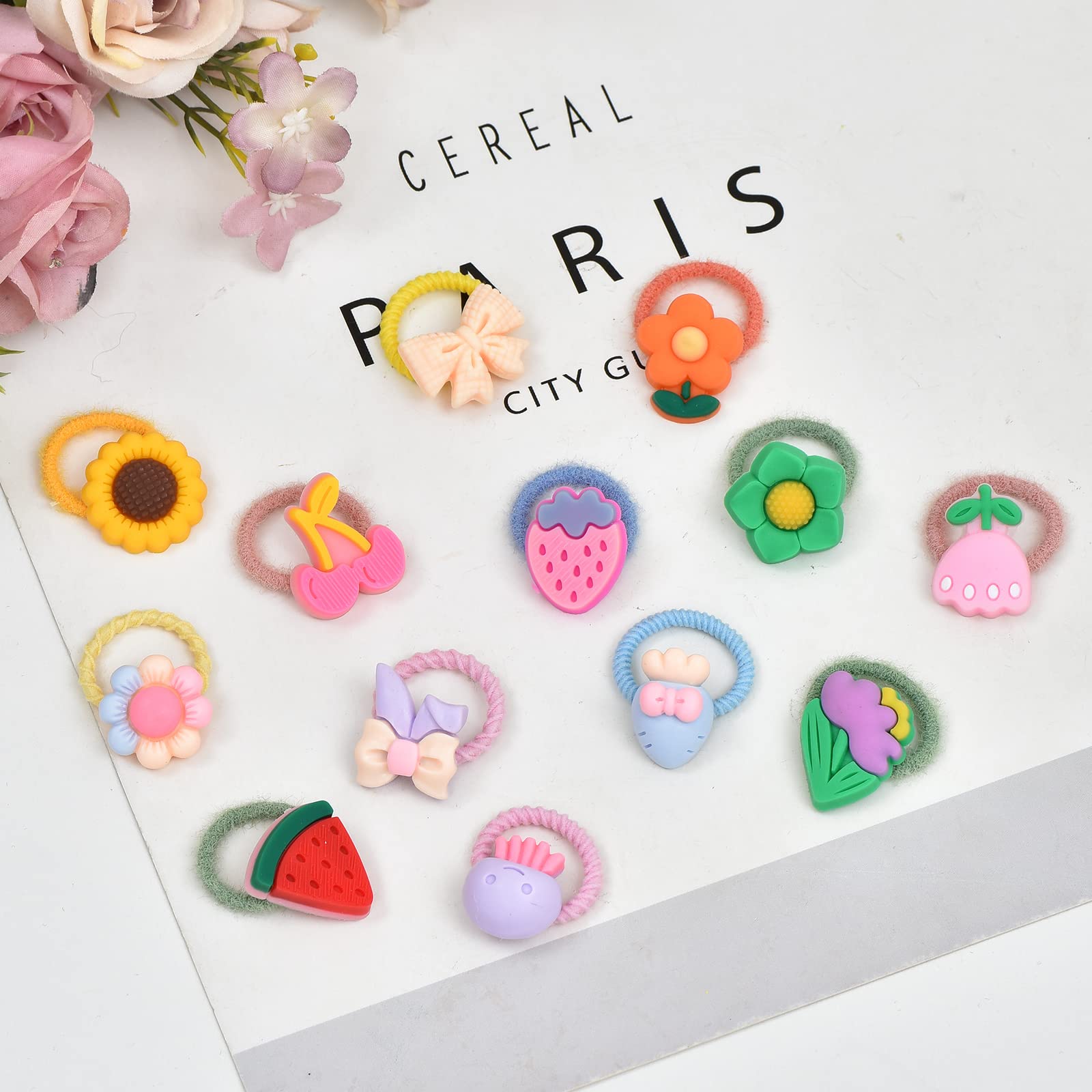 LIUCHENLIIVY cute cartoon designs on hair ties for kids.