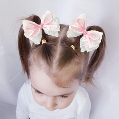 LMYMHMLM pink lace bow with fabric wrap protects hair and stays in place.