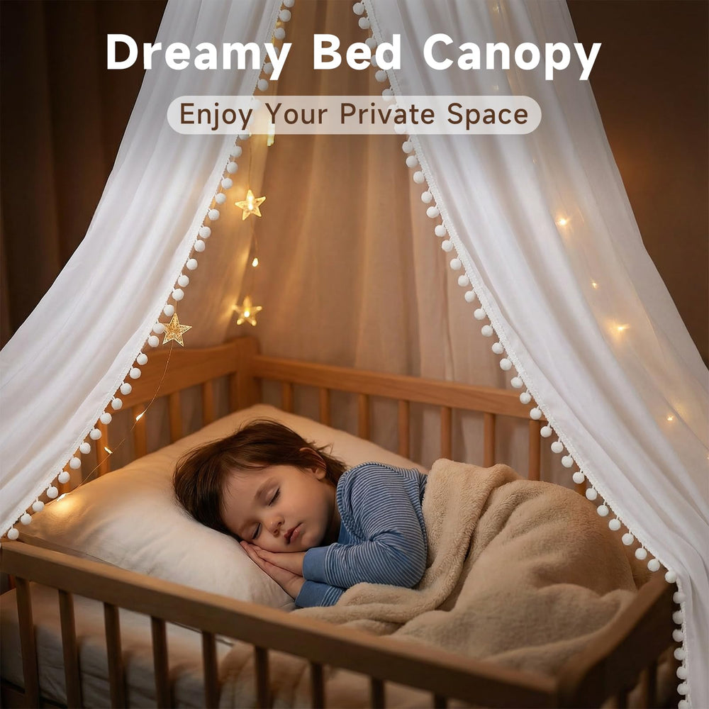 LOAOL pom-pom canopy over bed enhances bedtime play and imagination.