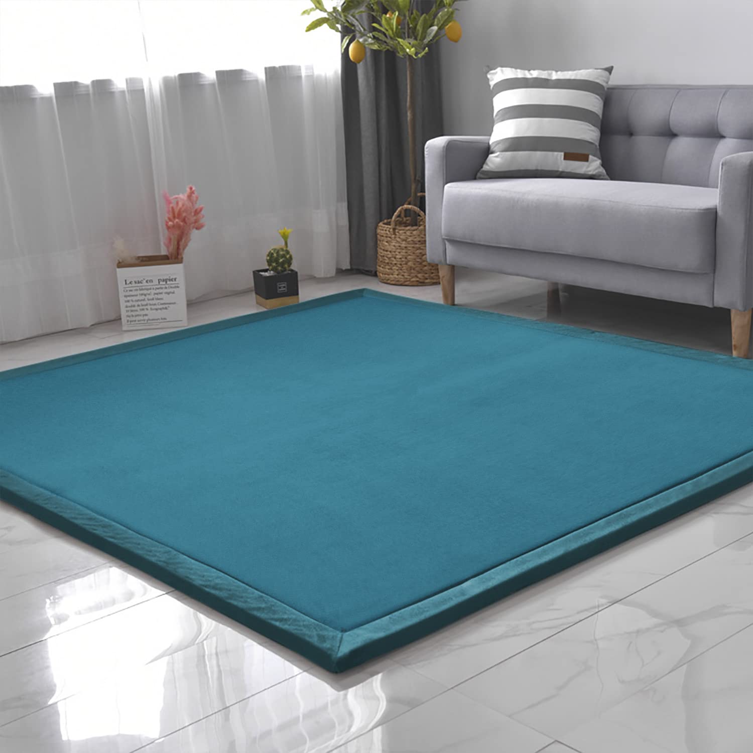 Loartee coral velvet crawling rug blue non-slip bottom prevents movement during play.