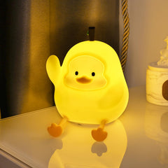 loatme yellow duck night light on table provides gentle ambient illumination for kids