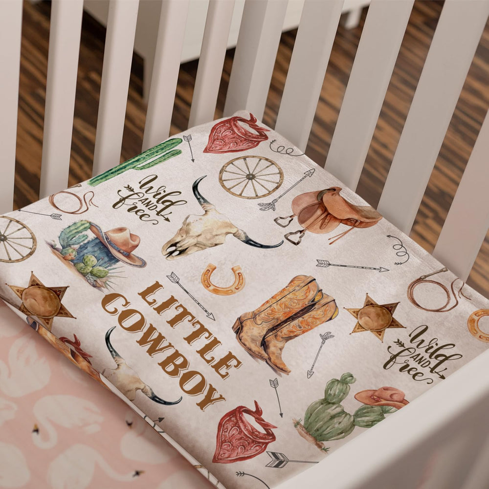 Locobird western blanket enhances nursery decor with rustic charm.