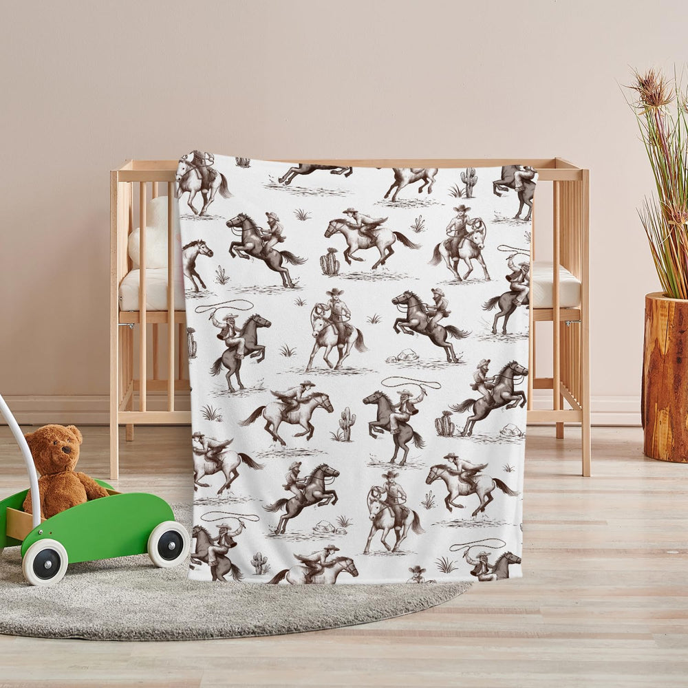 Locobird Western Blanket used for tummy time and cuddling.