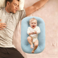 Loevin Baby Lounger Misty Blue vacuum-pack image highlights portable packaging.
