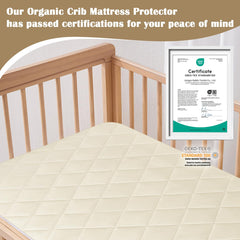 Soft organic cotton surface of LOFE crib protector in use.