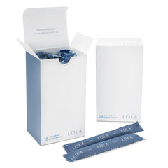 LOLA tampon with cardboard applicator in a closed pack for easy storage.