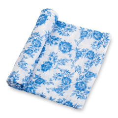 LollyBanks baby swaddle blanket in blue peony print, soft breathable muslin for newborn snug evenings.