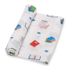 LollyBanks Books print swaddle blanket provides gentle warmth for newborn rest.