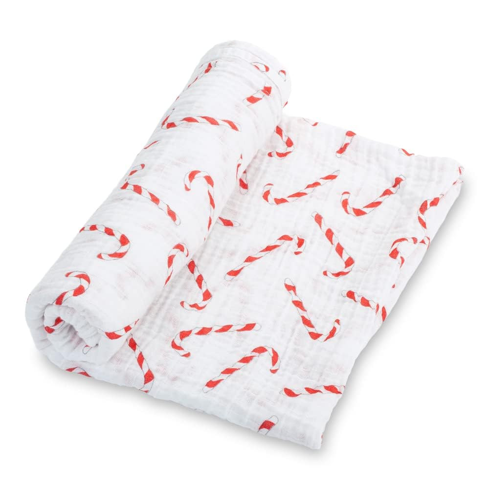 LollyBanks candy cane swaddle blanket closeup shows soft cotton muslin and cozy wrap