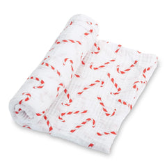 LollyBanks candy cane swaddle blanket closeup shows soft cotton muslin and cozy wrap