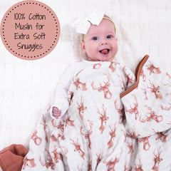 LollyBanks deer head print blanket in a nursery scene for woodland charm and warmth