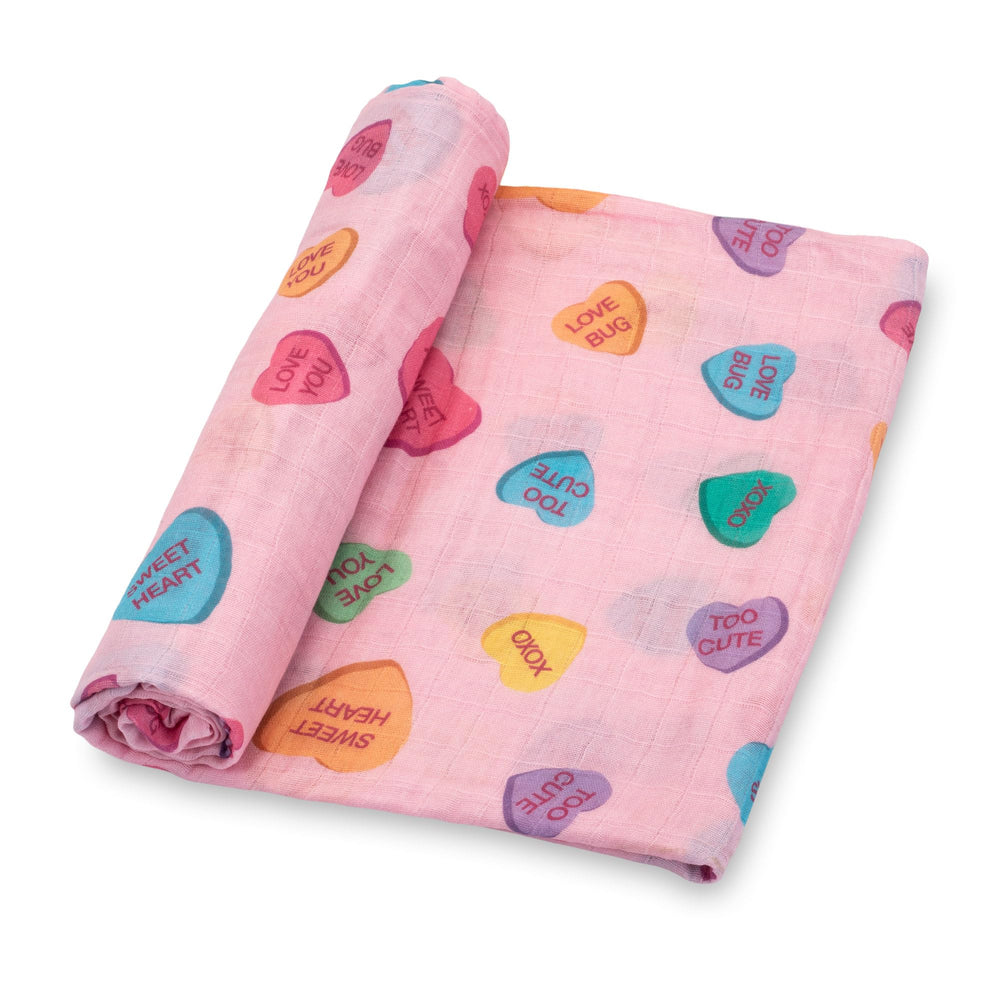 LollyBanks heart print muslin swaddle close-up for cozy newborn swaddling.