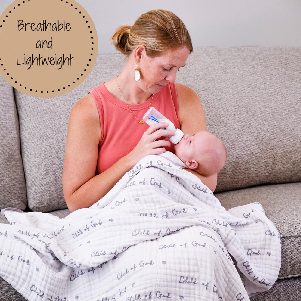 LollyBanks muslin baby blanket folded in nursery for cozy warmth.
