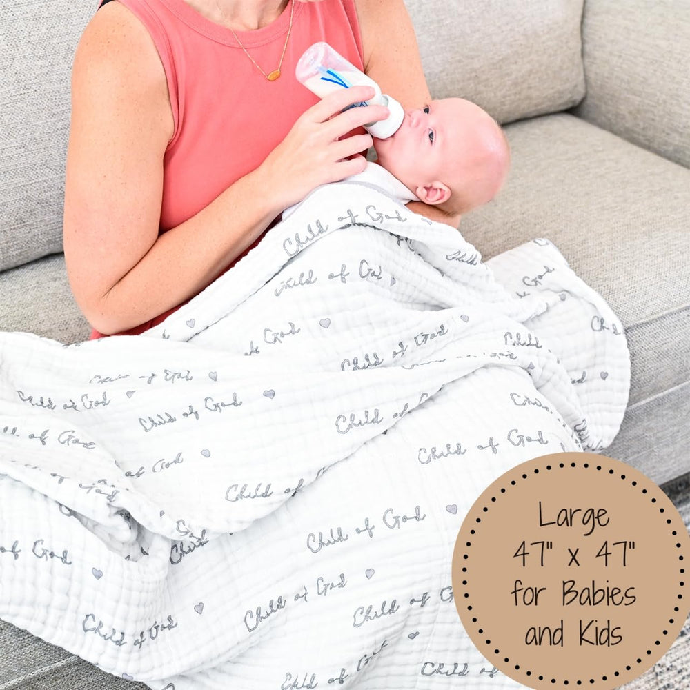 LollyBanks muslin baby blanket in nursery crib setup for comfort.
