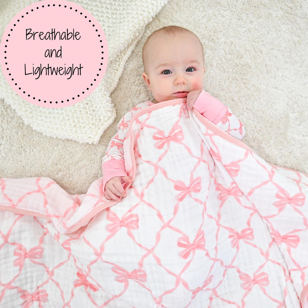 LollyBanks muslin blanket 47x47 size displayed in a nursery layout.