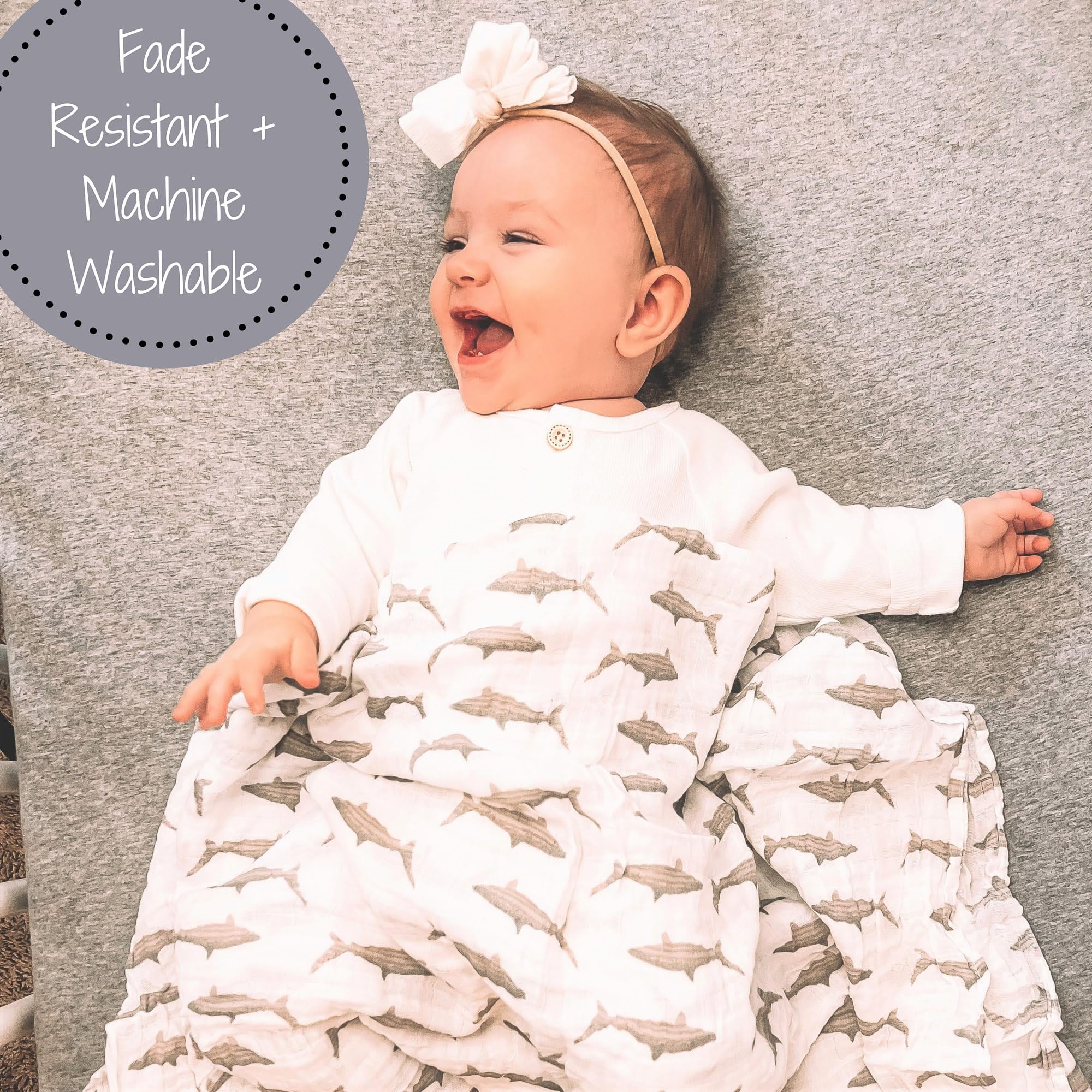 LollyBanks muslin swaddle close-up shows breathable soft fabric.