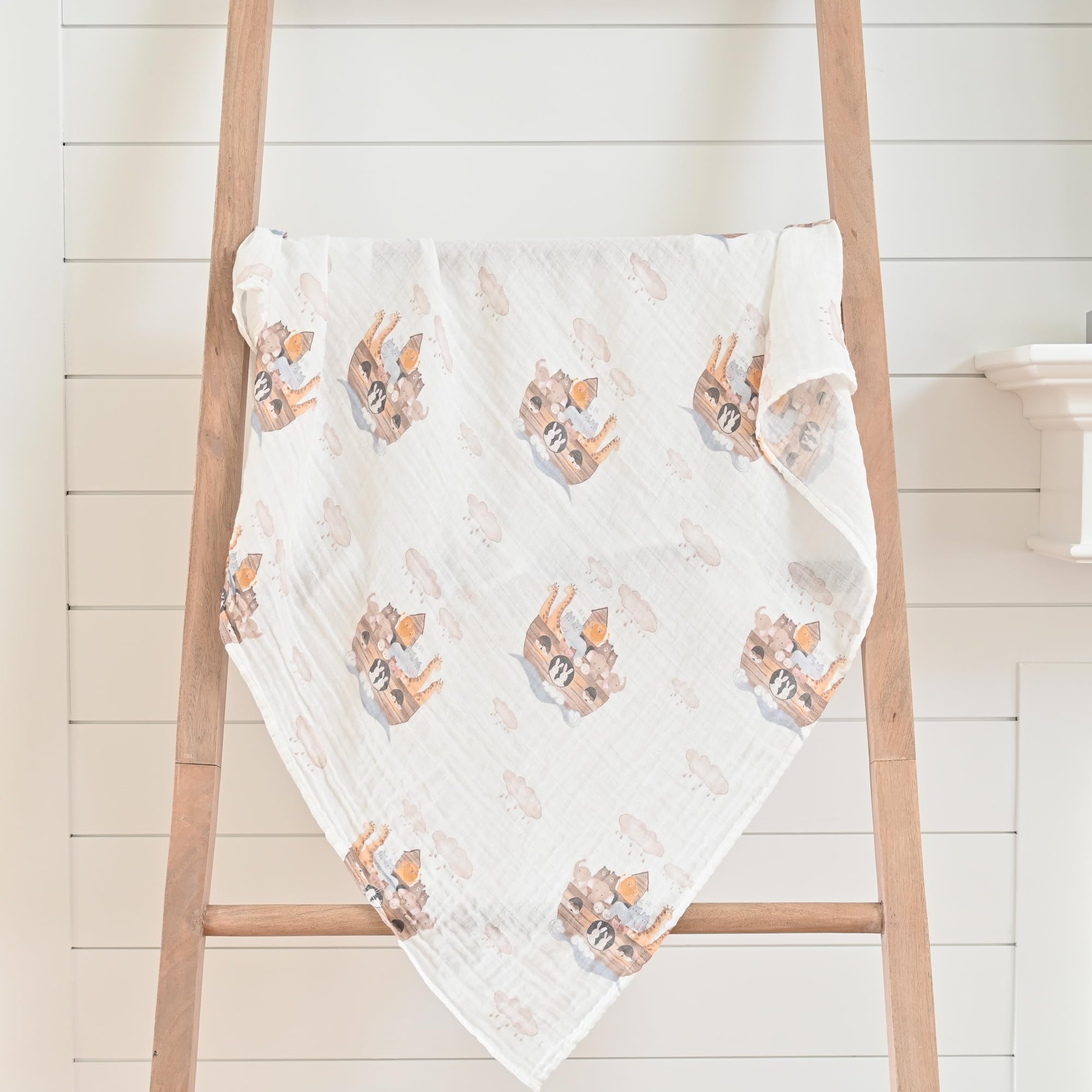 LollyBanks machine-wash care tag detail on swaddle fabric