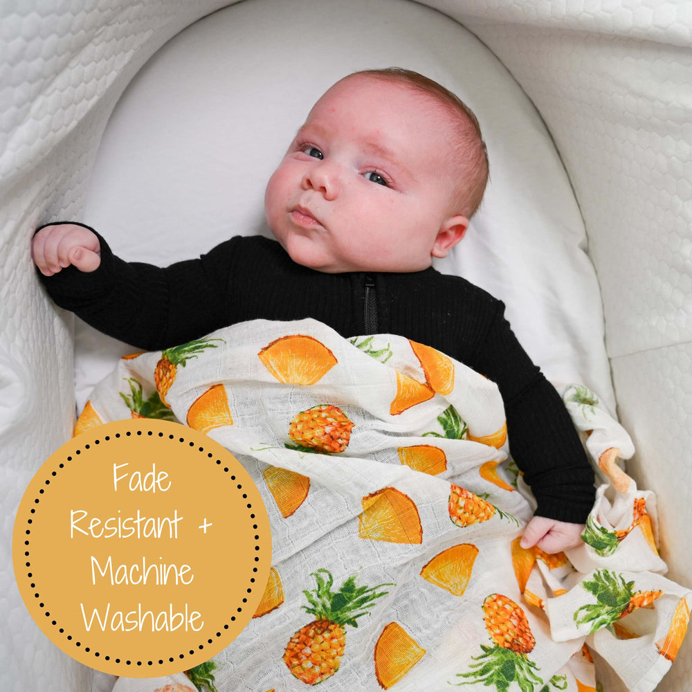 LollyBanks muslin swaddle in soft cotton for breathable newborn comfort.