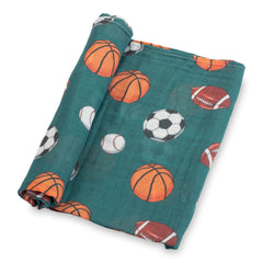 LollyBanks Muslin Swaddle with sports print for lightweight, comfortable wrapping.