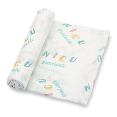 LollyBanks NICU-inspired swaddle blanket close-up showing breathable cotton muslin for comfort.