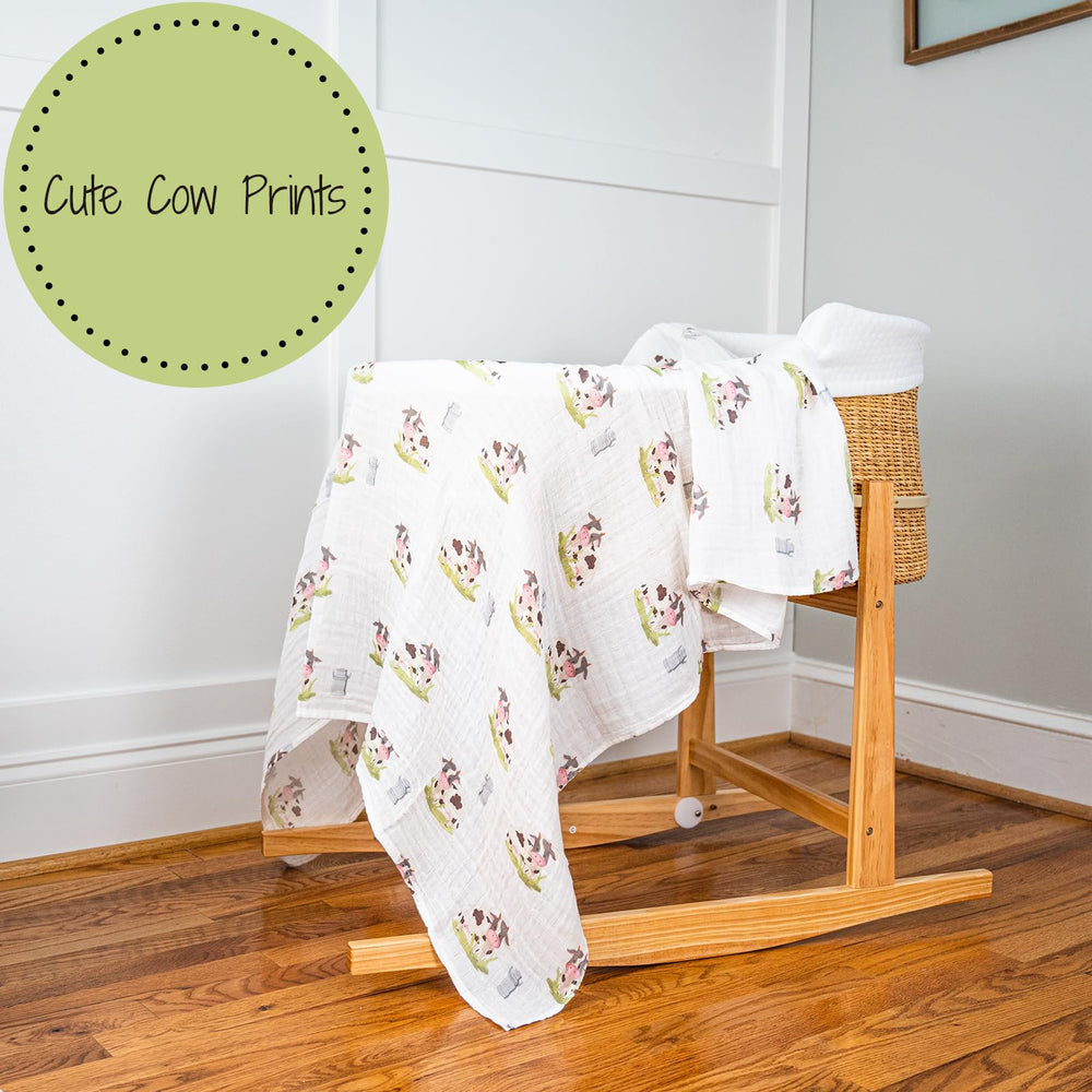 LollyBanks nursery decor friendly swaddle hanging on crib