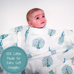 LollyBanks nursery decor swaddle adds soft texture to the crib.