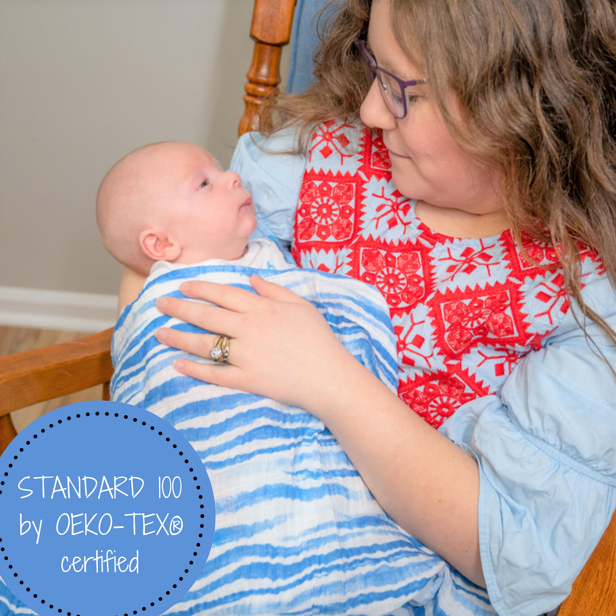 LollyBanks swaddle used as nursing cover and burp cloth in daily routine
